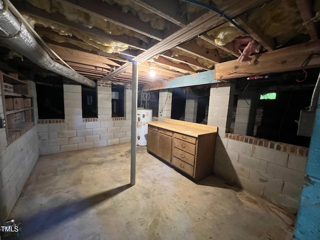 106 Orchard Rd, Henderson, NC 27536 - unfinished below grade area featuring concrete block wall and water heater