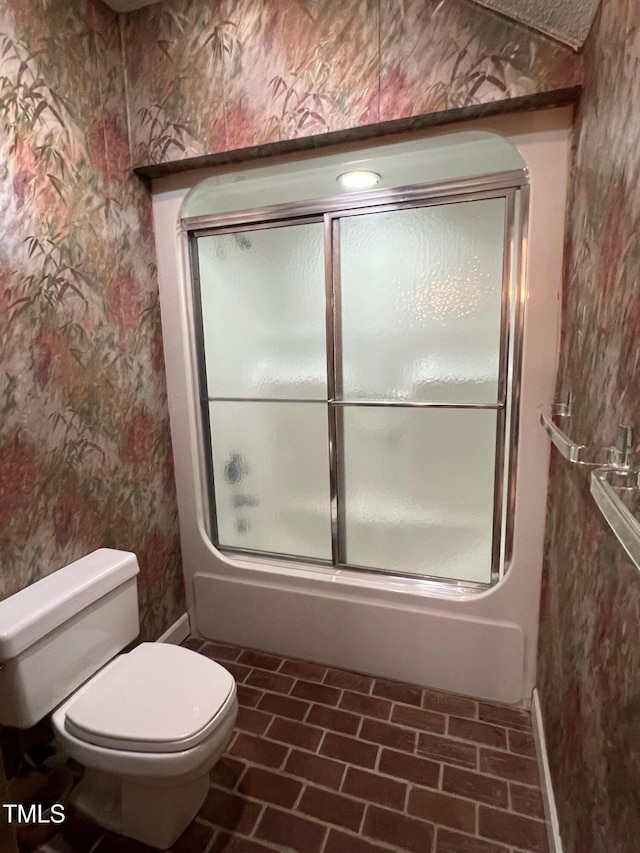 106 Orchard Rd, Henderson, NC 27536 - full bathroom with wallpapered walls, toilet, brick patterned floors, and enclosed tub / shower combo