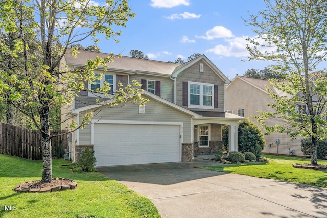 view of front of house featuring concrete driveway, fence, stone siding, and a front yard