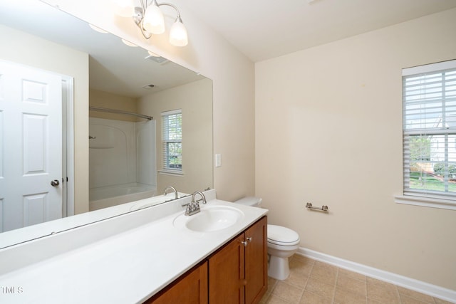 full bathroom with washtub / shower combination, vanity, baseboards, tile patterned floors, and toilet