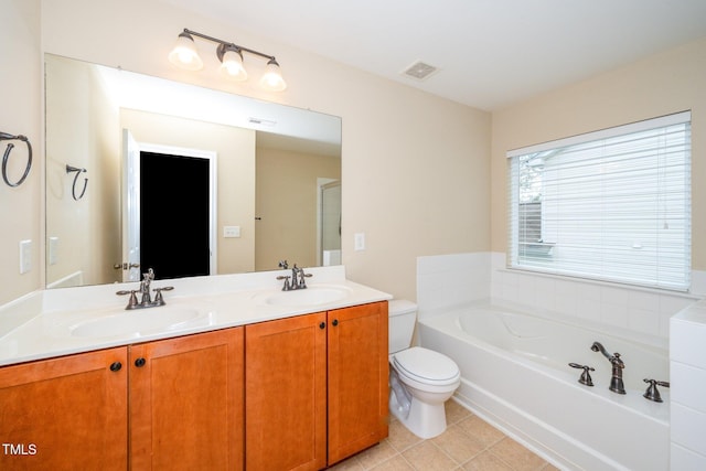 full bathroom featuring a sink, visible vents, toilet, and a garden tub