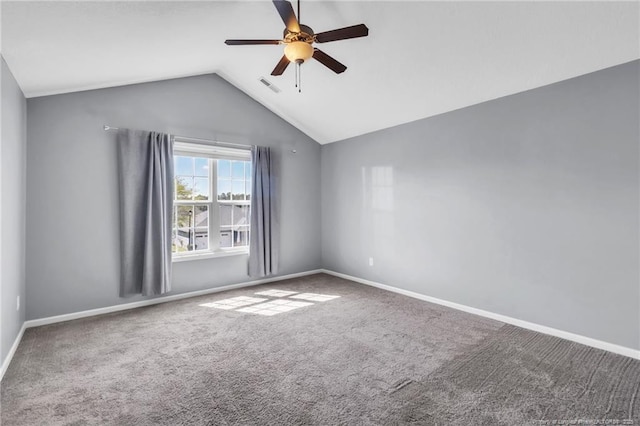 spare room with carpet floors, ceiling fan, and baseboards