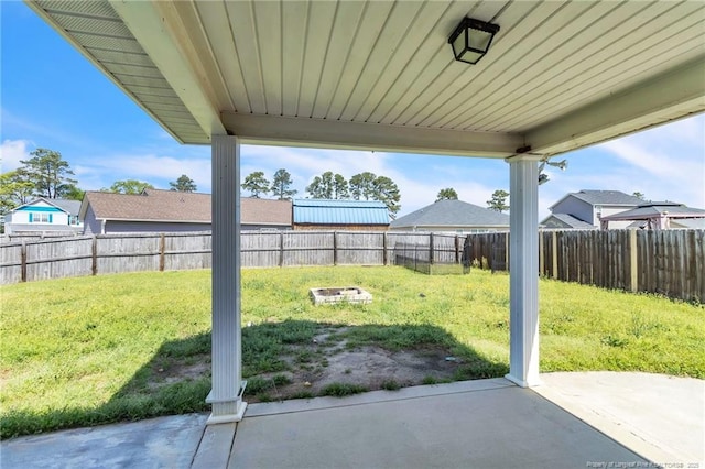 view of yard with a patio area and a fenced backyard
