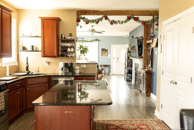 186 Kentucky Derby Ln, Lillington, NC 27546 - kitchen with open shelves, stainless steel dishwasher, a ceiling fan, a kitchen island, and dark wood finished floors