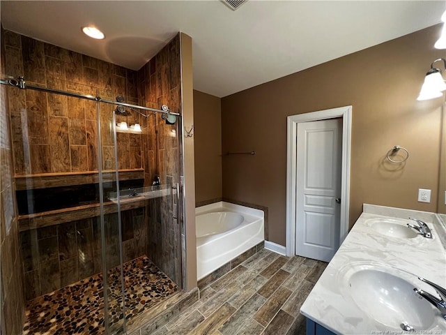 186 Kentucky Derby Ln, Lillington, NC 27546 - full bath with a bath, a stall shower, double vanity, wood finished floors, and baseboards