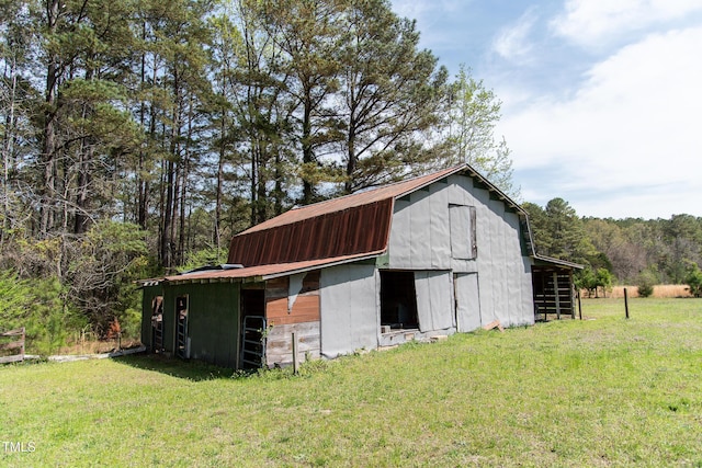 1556 Pleasants Rd, Wendell, NC 27591 - view of barn featuring a yard