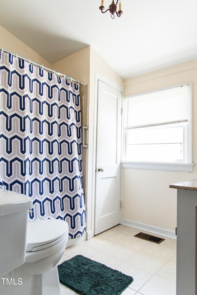 1556 Pleasants Rd, Wendell, NC 27591 - bathroom featuring baseboards, tile patterned flooring, a shower with curtain, toilet, and visible vents