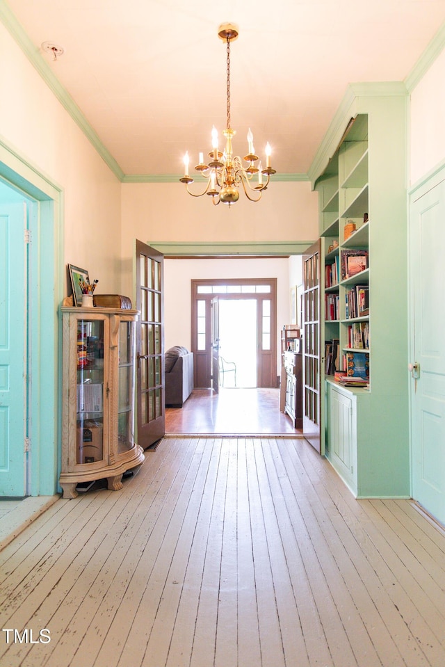 1556 Pleasants Rd, Wendell, NC 27591 - foyer entrance featuring a chandelier, french doors, hardwood / wood-style flooring, and ornamental molding