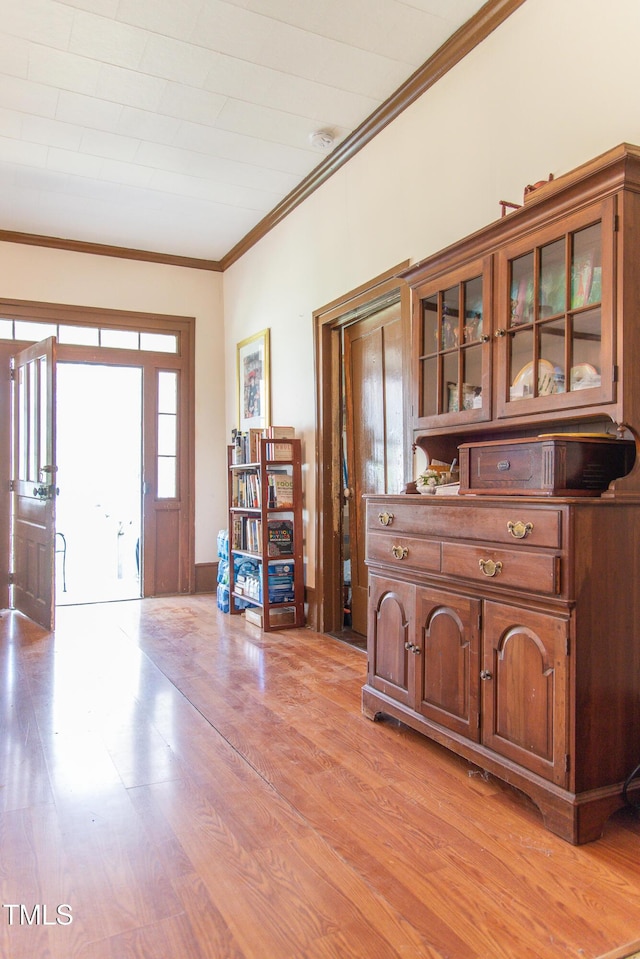 1556 Pleasants Rd, Wendell, NC 27591 - foyer featuring crown molding and light wood finished floors