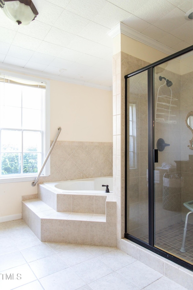 1556 Pleasants Rd, Wendell, NC 27591 - bathroom with a bath, crown molding, a stall shower, and tile patterned floors