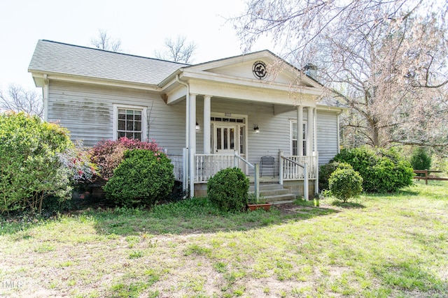 1556 Pleasants Rd, Wendell, NC 27591 - view of front of house with a porch and a front lawn