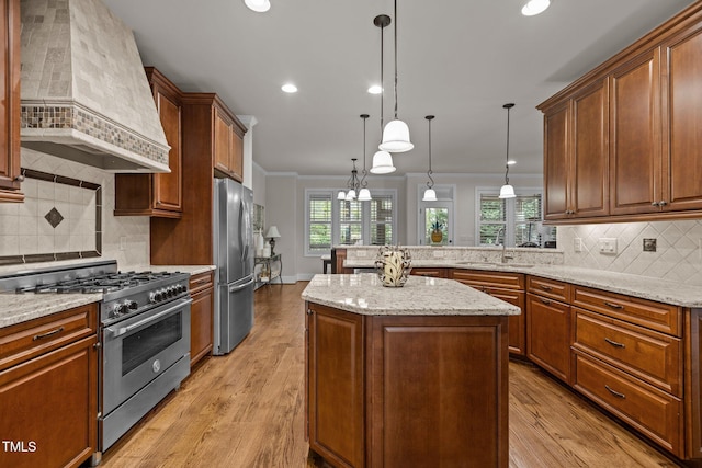 1512 Piazzo Ct, Apex, NC 27502 - kitchen with appliances with stainless steel finishes, premium range hood, a sink, backsplash, and recessed lighting