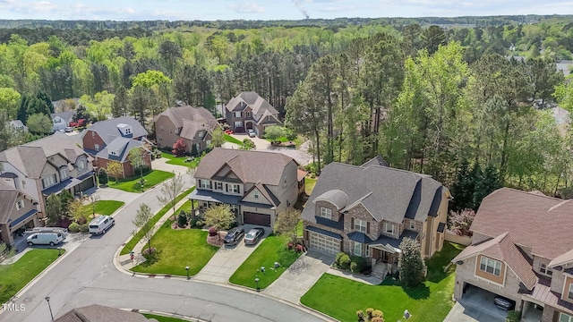 1512 Piazzo Ct, Apex, NC 27502 - aerial view of residential area with a heavily wooded area