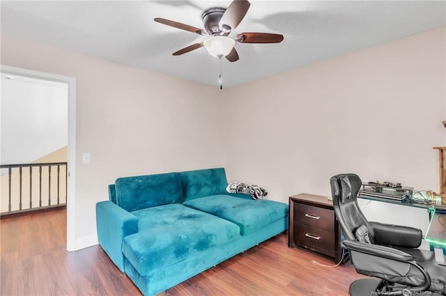 office space featuring a ceiling fan and wood finished floors