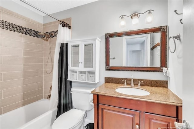 bathroom featuring shower / tub combo, vanity, and toilet