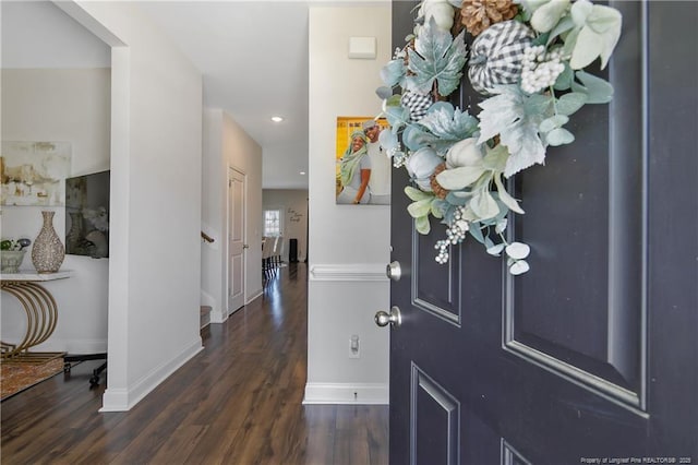 foyer entrance featuring recessed lighting, baseboards, and wood finished floors