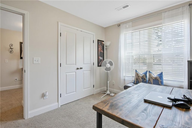 home office featuring carpet flooring, visible vents, and baseboards