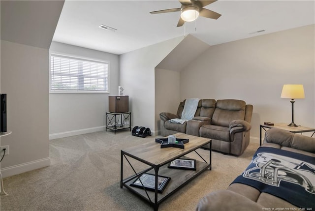 carpeted living area with baseboards, a ceiling fan, and visible vents