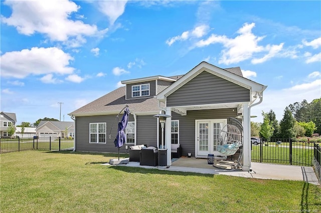 rear view of house with an outdoor hangout area, a patio area, a fenced backyard, and a lawn