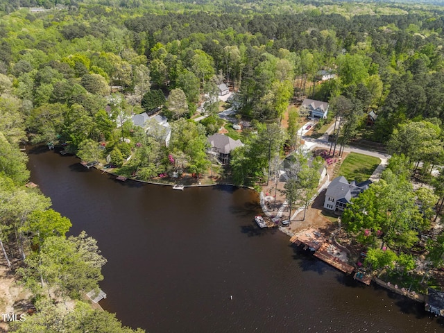 955 Sagamore Dr, Louisburg, NC 27549 - drone / aerial view with a wooded view and a water view