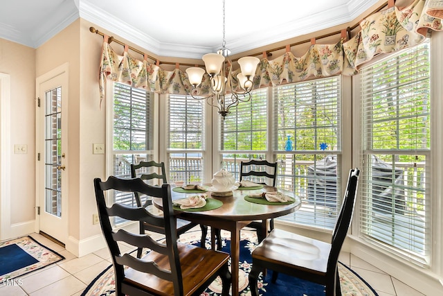 955 Sagamore Dr, Louisburg, NC 27549 - dining space featuring light tile patterned floors, a notable chandelier, ornamental molding, and baseboards