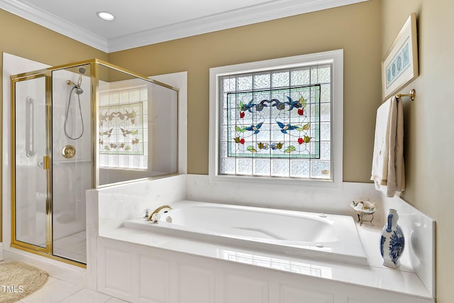 955 Sagamore Dr, Louisburg, NC 27549 - bathroom with crown molding, a garden tub, tile patterned flooring, and a stall shower