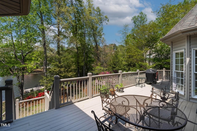 955 Sagamore Dr, Louisburg, NC 27549 - wooden deck featuring a water view and outdoor dining space