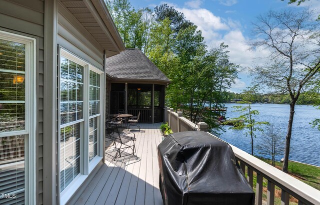 955 Sagamore Dr, Louisburg, NC 27549 - wooden terrace with a water view and a grill