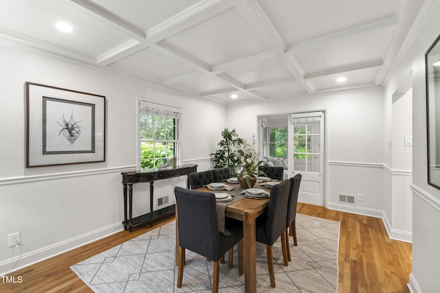 4902 Brookhaven Dr, Raleigh, NC 27612 - dining area featuring healthy amount of natural light, light wood-style floors, beam ceiling, coffered ceiling, and recessed lighting