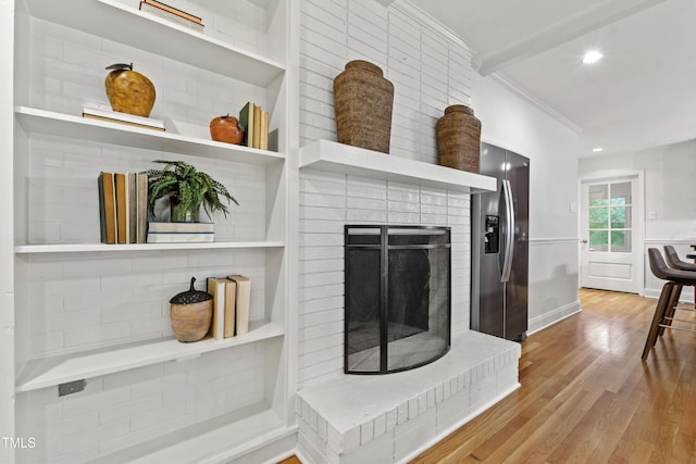 4902 Brookhaven Dr, Raleigh, NC 27612 - living area featuring ornamental molding, wood finished floors, recessed lighting, and a brick fireplace