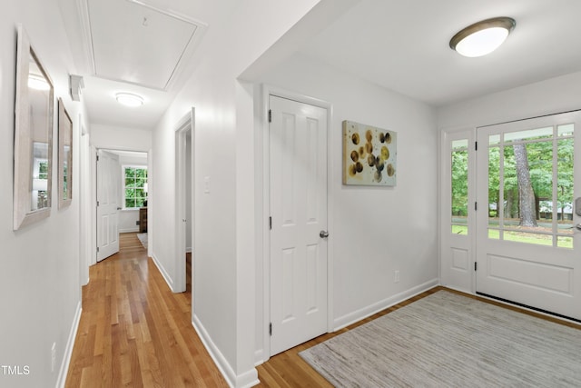 4902 Brookhaven Dr, Raleigh, NC 27612 - foyer entrance with light wood-style floors and baseboards