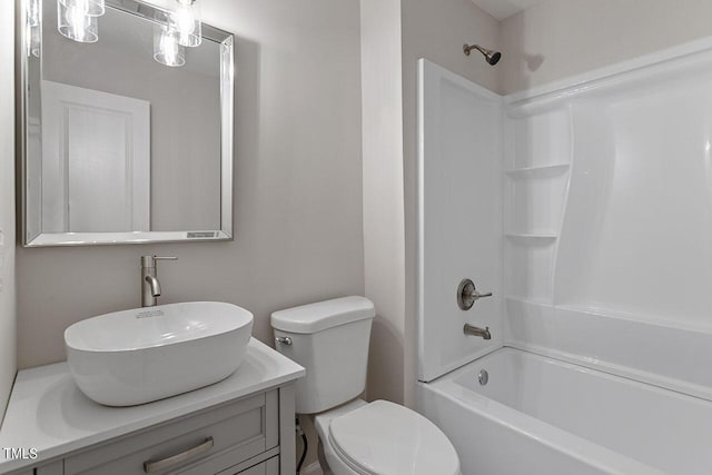 full bathroom featuring toilet, vanity, and shower / bath combination