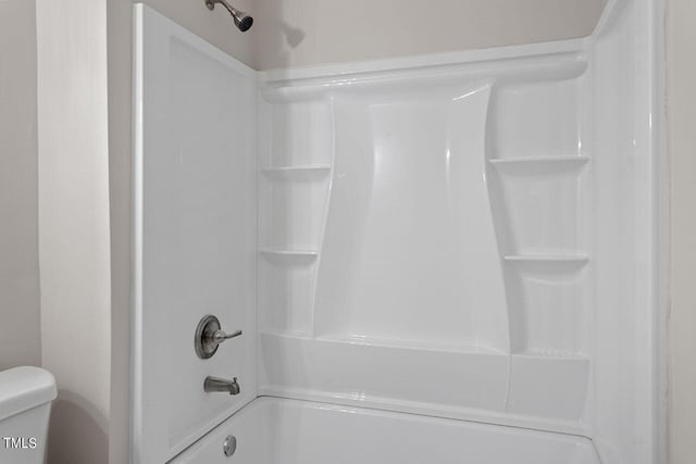 full bathroom featuring toilet