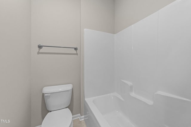 219 Zante Currant Rd, Durham, NC 27703 - full bathroom featuring toilet, baseboards, and a shower