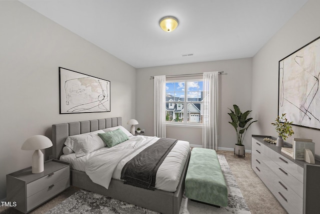 219 Zante Currant Rd, Durham, NC 27703 - bedroom featuring visible vents, light colored carpet, and baseboards