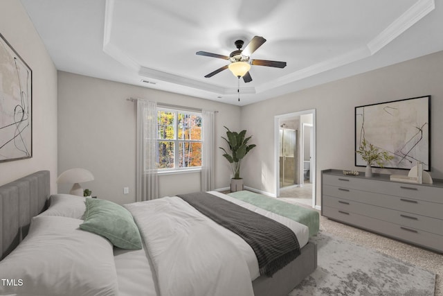 219 Zante Currant Rd, Durham, NC 27703 - bedroom with a tray ceiling, light colored carpet, a ceiling fan, ornamental molding, and visible vents