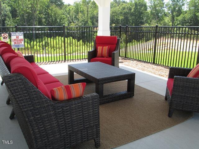 219 Zante Currant Rd, Durham, NC 27703 - view of patio / terrace featuring fence