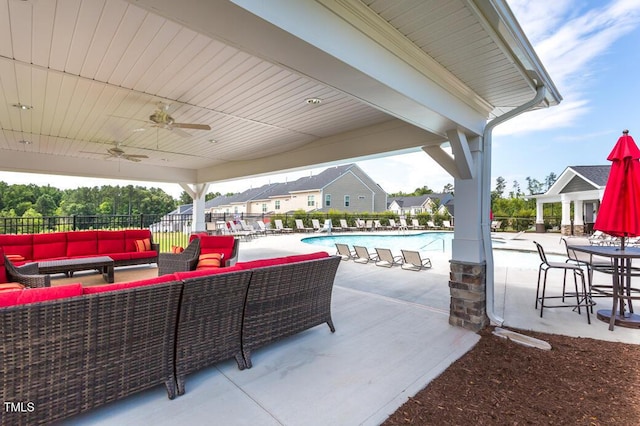 219 Zante Currant Rd, Durham, NC 27703 - view of patio / terrace featuring an outdoor living space, a community pool, ceiling fan, and fence