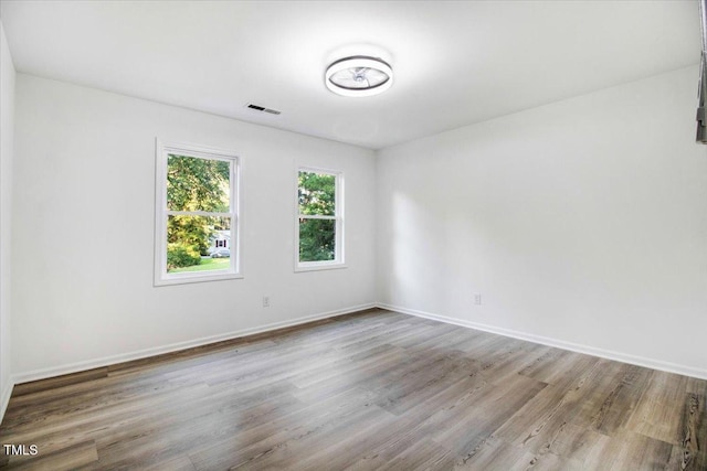 1506 Darby Rd, Goldsboro, NC 27534 - unfurnished room with wood finished floors and baseboards