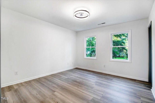 1506 Darby Rd, Goldsboro, NC 27534 - spare room featuring wood finished floors and baseboards