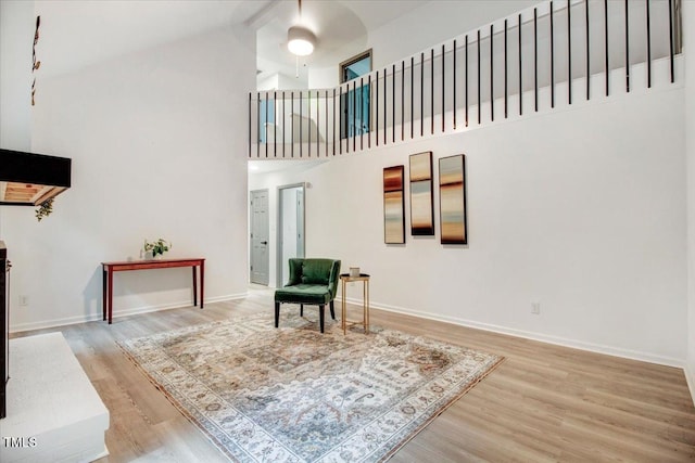 1506 Darby Rd, Goldsboro, NC 27534 - sitting room featuring high vaulted ceiling and wood finished floors