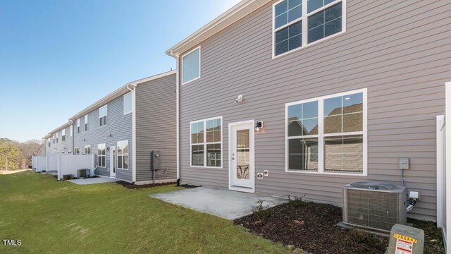 2318 Sugar Cone Way, Fuquay Varina, NC 27526 - back of house with a yard, a patio area, and cooling unit