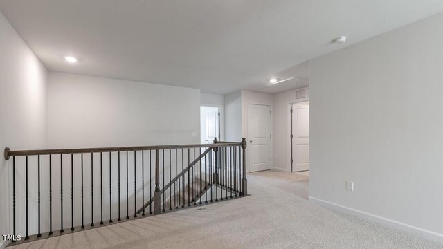 2318 Sugar Cone Way, Fuquay Varina, NC 27526 - corridor featuring baseboards, recessed lighting, an upstairs landing, carpet floors, and visible vents