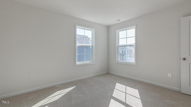 2318 Sugar Cone Way, Fuquay Varina, NC 27526 - unfurnished room with light colored carpet, baseboards, and visible vents