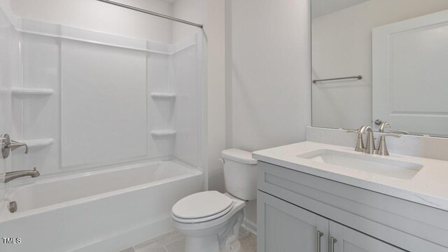 2318 Sugar Cone Way, Fuquay Varina, NC 27526 - full bath with tile patterned floors, toilet, vanity, and shower / bath combination