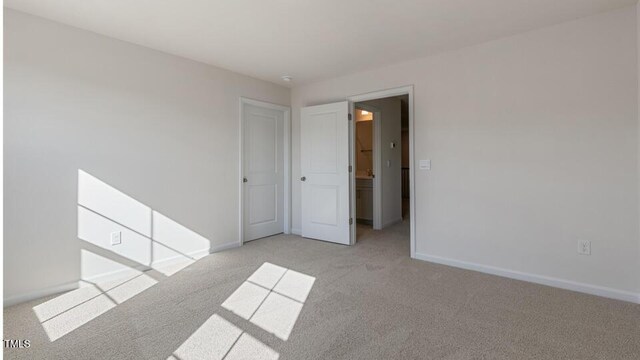 2318 Sugar Cone Way, Fuquay Varina, NC 27526 - unfurnished bedroom with light colored carpet and baseboards