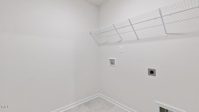 2318 Sugar Cone Way, Fuquay Varina, NC 27526 - clothes washing area with laundry area, washer hookup, baseboards, and electric dryer hookup