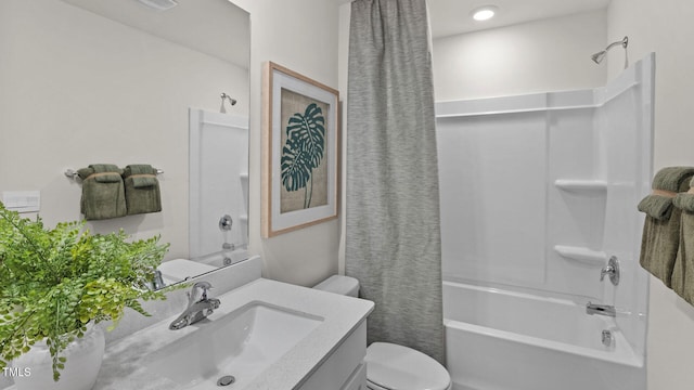 full bath featuring shower / bath combo, toilet, and vanity