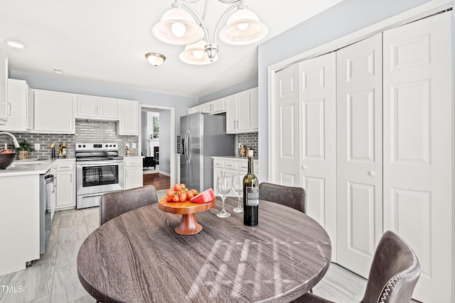 dining room with marble finish floor