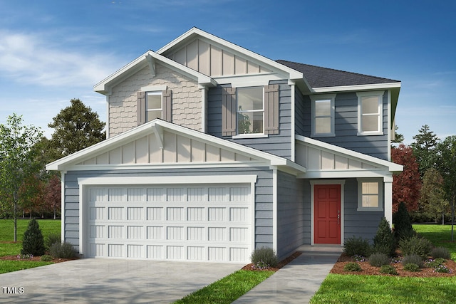 view of front of house with board and batten siding, driveway, and a garage
